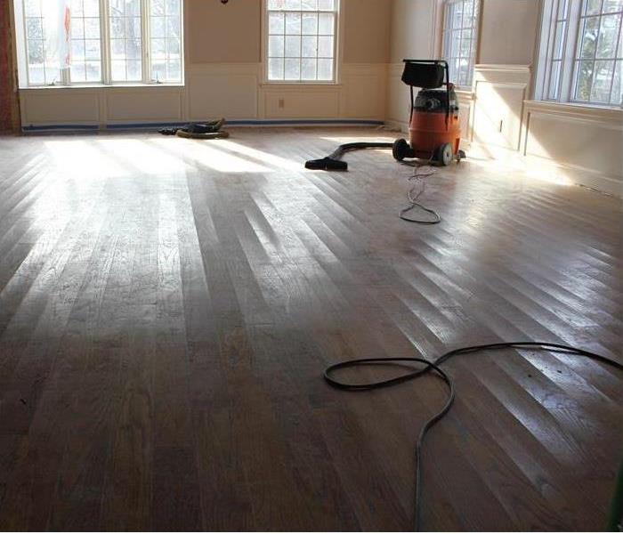 heavy duty vac, slight cupped floorboards, clean room now