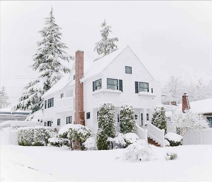 West Seattle winter home covered in snow